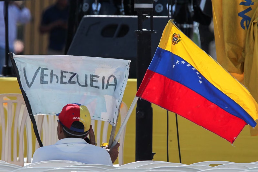 Imagem: vENEZUELA Venezuelanos sobrevivem com centavos mesmo após promessa de ‘renascimento econômico’